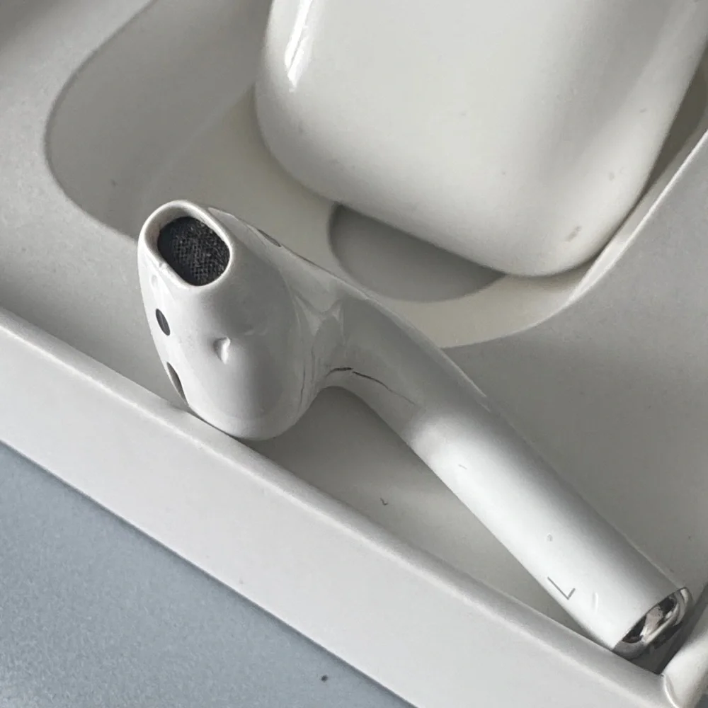 Apple AirPods with Charging Case - White